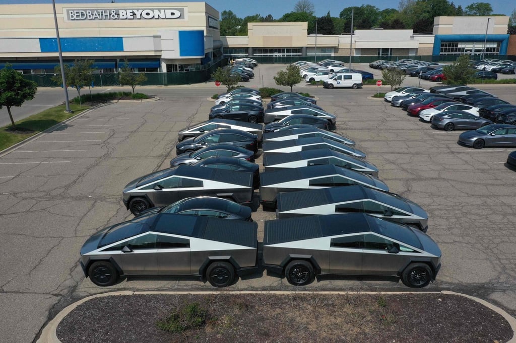Unsold Tesla Cybertrucks sit in a car park at a shopping centre in Michigan. Shares of the carmaker are down 20 per cent since US President Donald Trump took office. Photo: Getty Images via AFP