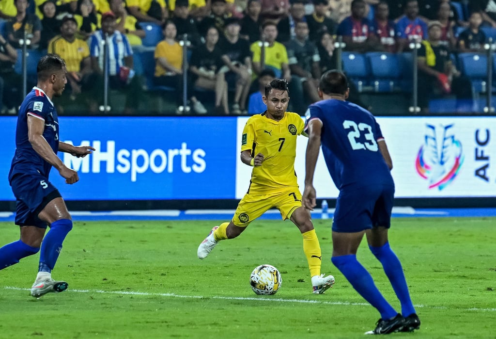 Faisal Halim (in yellow) came on as a substitute in Malaysia’s 2-0 win over Nepal. Photo: AFP