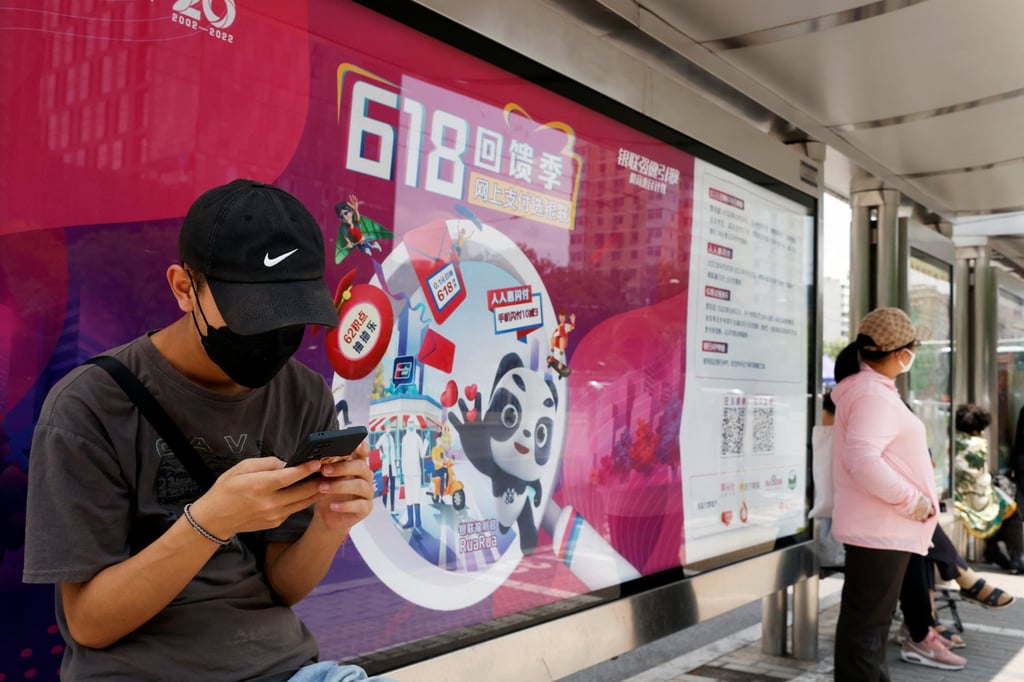 A UnionPay advertisement for the midyear 618 shopping festival is displayed at a bus stop in Beijing. Photo: Reuters A UnionPay advertisement for the midyear 618 shopping festival is displayed at a bus stop in Beijing. Photo: Reuters