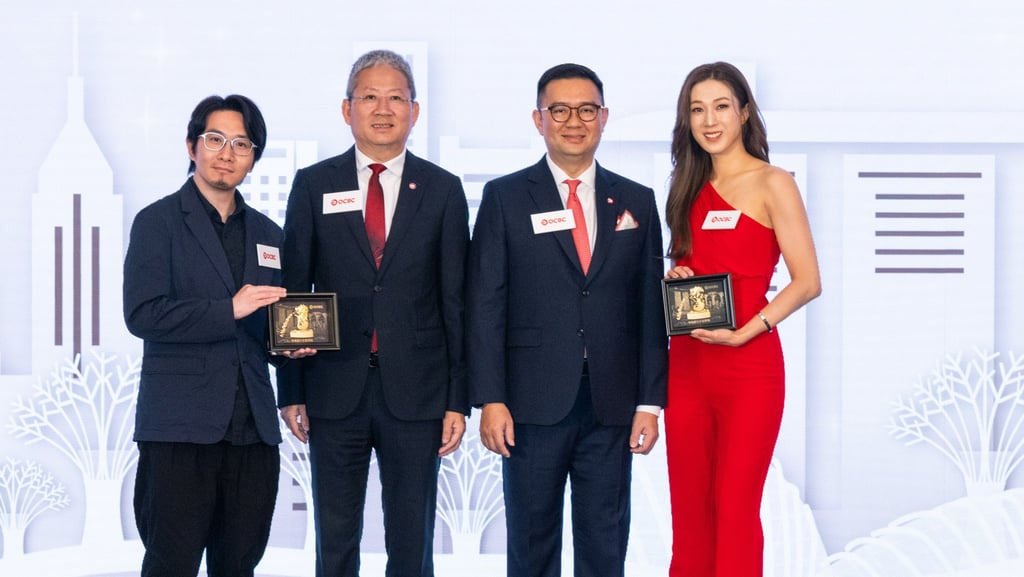 Film director Nick Cheuk (left) and actress Linda Chung (right) pose with OCBC executives at the launch ceremony.