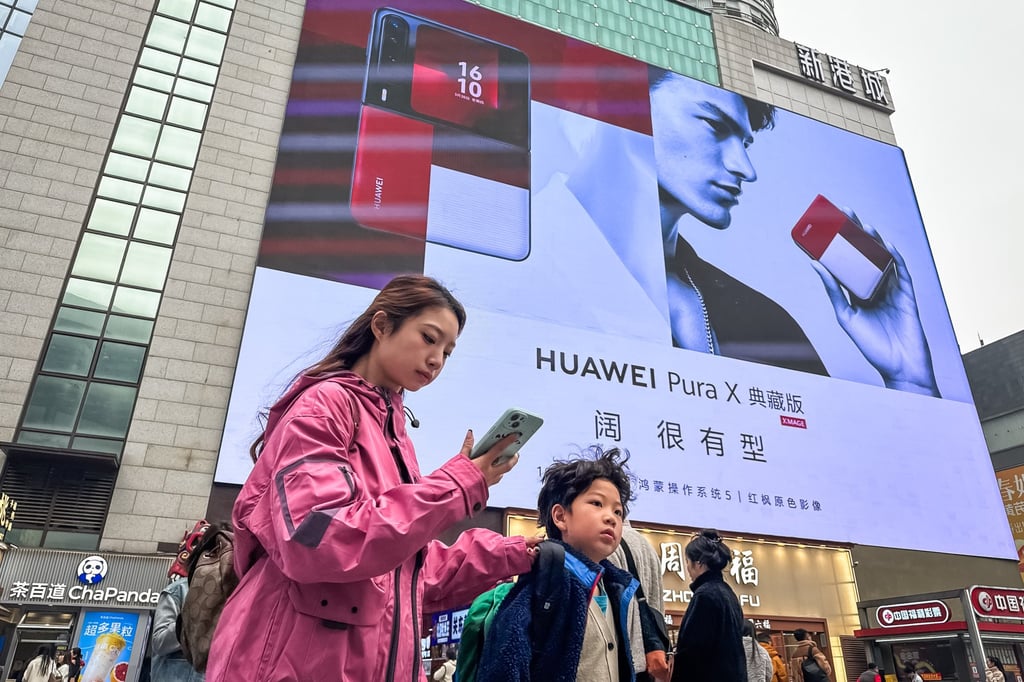 A billboard advertisement for the Huawei Pura X smartphone launched in March. Photo: Getty Images A billboard advertisement for the Huawei Pura X smartphone launched in March. Photo: Getty Images
