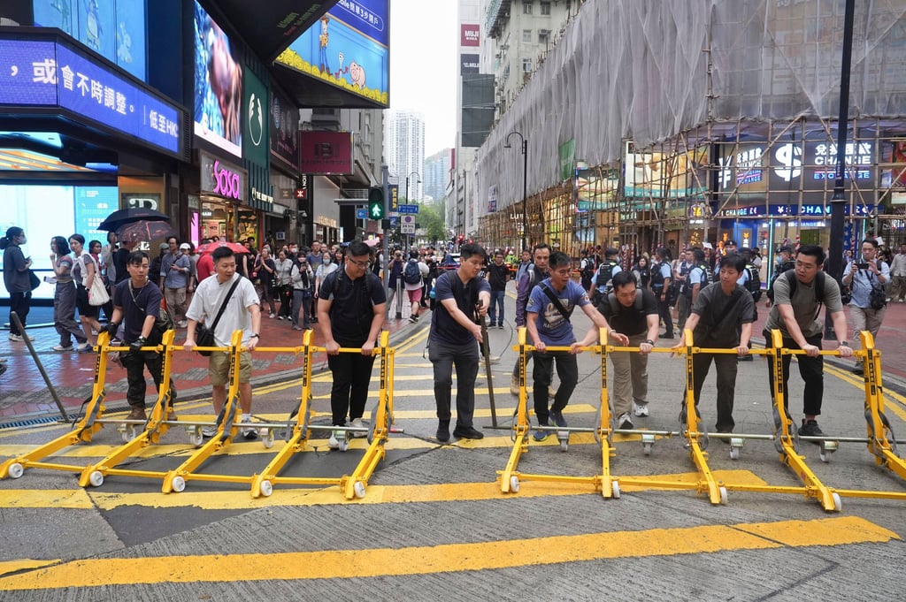 Police officers block off East Point Road in Causeway Bay. Photo: Elson Li Police officers block off East Point Road in Causeway Bay. Photo: Elson Li