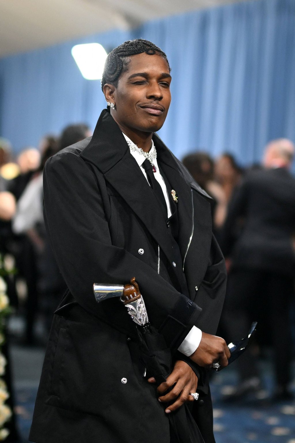 A$AP Rocky at the Met Gala with a custom Briony Raymond silver umbrella, set with 90 carats of diamonds. Photo: AFP