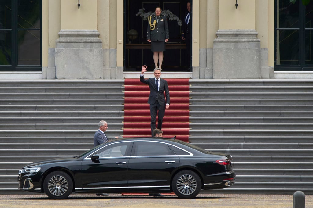 Dutch Prime Minister Dick Schoof waves after handing in the resignation of Geert Wilder’s PVV party ministers to King Willem-Alexander at royal palace in The Hague on Tuesday. Photo: AP