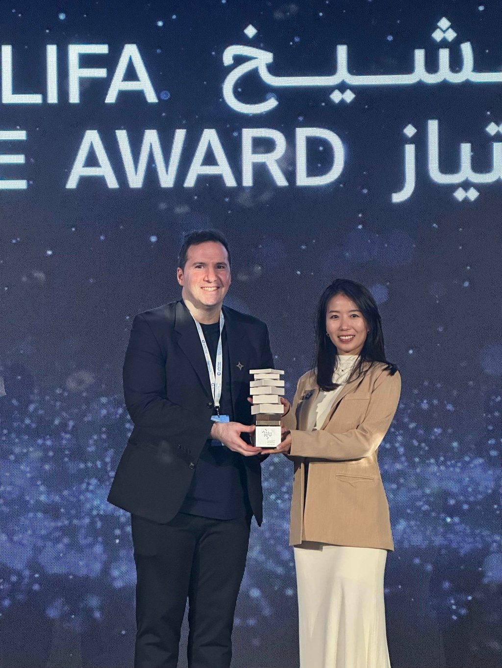 Deniz Tekerek (left), Archireef’s co-founder and chief commercial officer, and Vriko Yu, the company’s co-founder and CEO, receive Abu Dhabi’s Sheikh Khalifa Excellence Award.