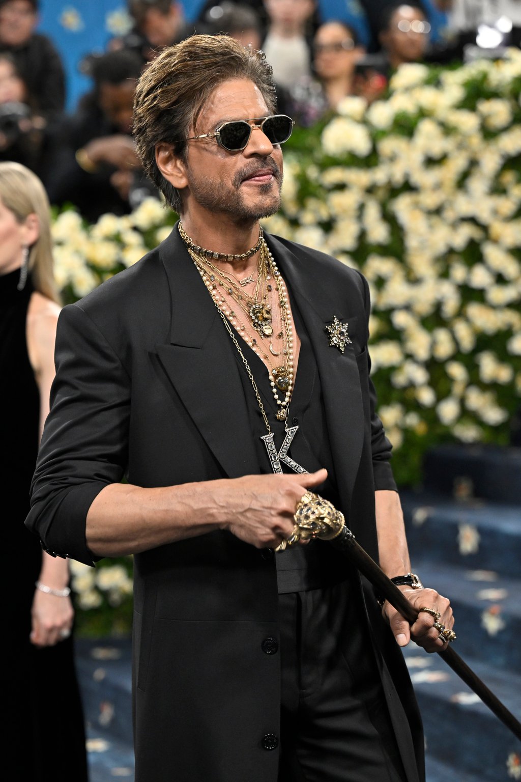 Bollywood legend Shah Rukh Khan was dressed by Sabyasachi Mukherjee, his look made complete with this Bengal Tiger Head cane. Photo: Invision/AP