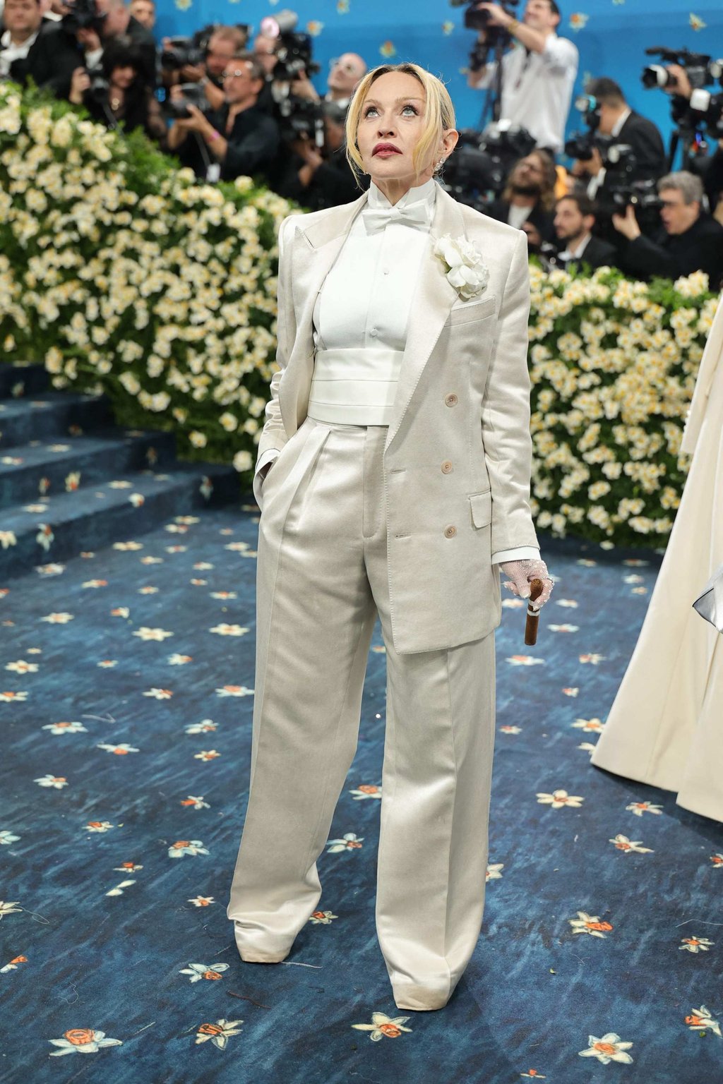 Madonna at the 2025 Met Gala in a cream suit by Tom Ford. Photo: Getty Images via AFP Madonna at the 2025 Met Gala in a cream suit by Tom Ford. Photo: Getty Images via AFP