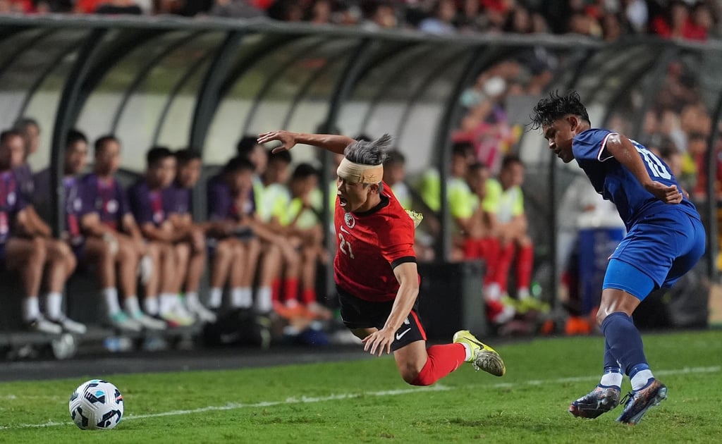 Hong Kong’s Yue Tze-nam is sent flying during his side’s game against Nepal. Photo: Elson Li Hong Kong’s Yue Tze-nam is sent flying during his side’s game against Nepal. Photo: Elson Li