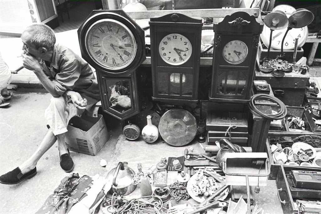 A hawker selling used goods on Upper Lascar Row in 1972. Photo: SCMP Archives A hawker selling used goods on Upper Lascar Row in 1972. Photo: SCMP Archives