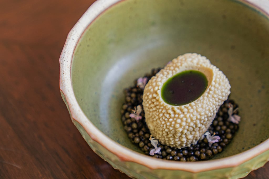 Durian mousse on a bed of Hua Hin caviar and topped with shiso leaf oil at Pru in Phuket. Photo: courtesy Pru