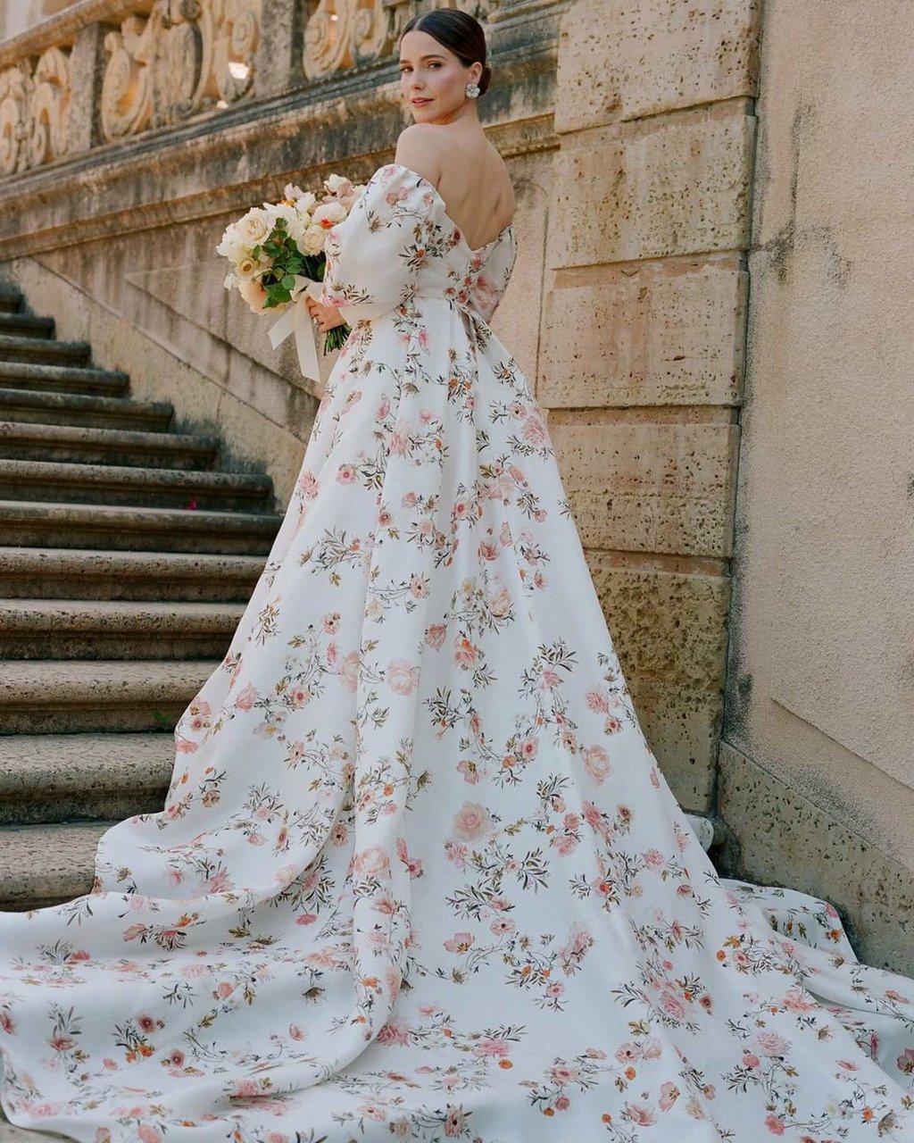 Sophia Bush opted for a floral wedding dress from Monique Lhuillier. Photo: @sophiabush/Instagram