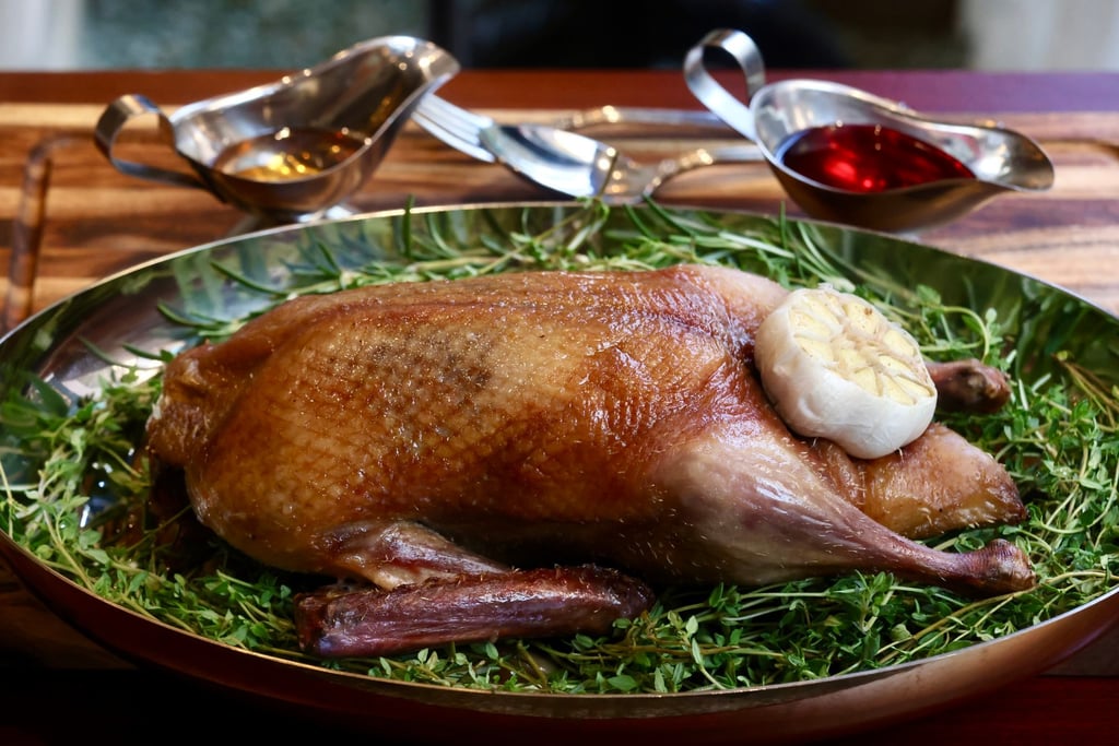 Whole roast dry-aged duck at Le Colvert. Photo: Jonathan Wong Whole roast dry-aged duck at Le Colvert. Photo: Jonathan Wong