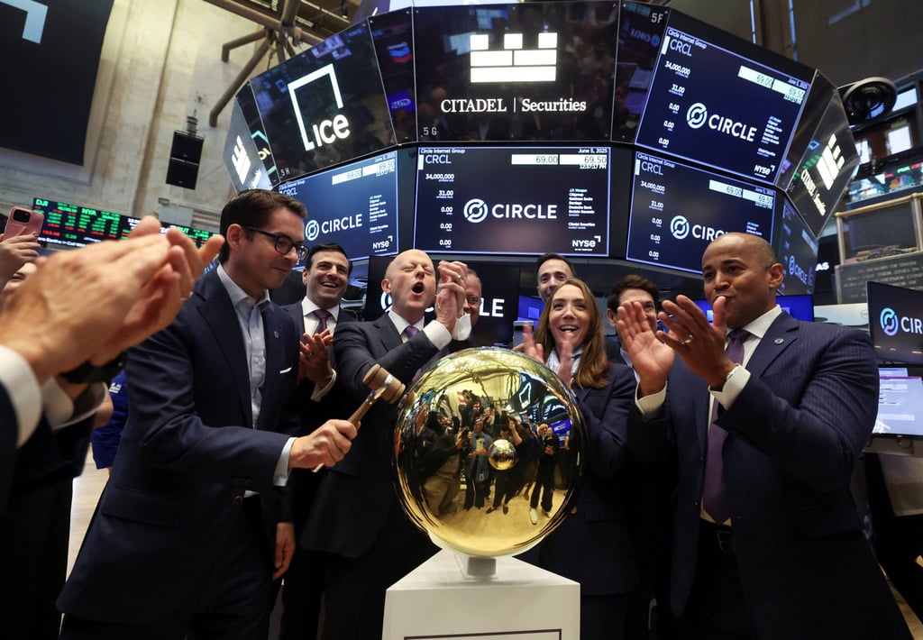 Jeremy Allaire, CEO and co-founder of Circle Internet Group, reacts as Circle president Heath Tarbert rings a ceremonial bell to commence trading on the New York Stock Exchange on Thursday. Photo: Reuters
