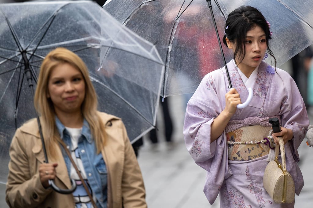 People visit a shopping street in Asakusa district near Sensoji Temple, a popular tourist location in Tokyo, during the last day of “Golden Week” holiday on May 6. Photo: AFP People visit a shopping street in Asakusa district near Sensoji Temple, a popular tourist location in Tokyo, during the last day of “Golden Week” holiday on May 6. Photo: AFP