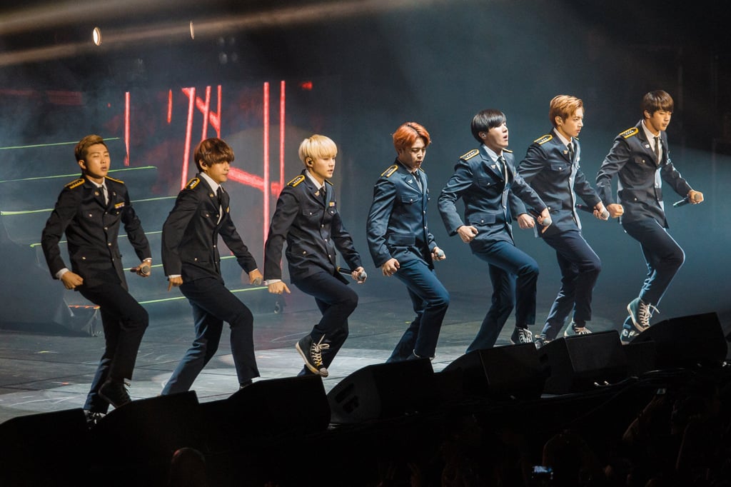 Korean boy band BTS – Jin, Suga, J-Hope, RM, Jimin, V and Jungkook – perform in military uniform in Sao Paulo, Brazil, in 2015 as if anticipating their coming mandatory service in South Korea’s armed forces. Photo: Getty Images