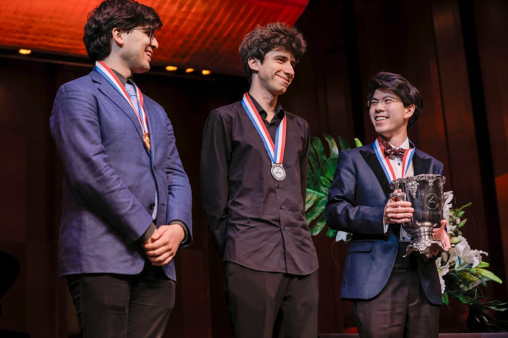Aristo Sham, of Hong Kong (right), the overall winner, bronze medal winner Evren Ozel, of the United States (left), and Vitaly Starikov, of Israel and Russia, who came second, during the awards ceremony of the 17th Van Cliburn International Piano Competition at Bass Hall in Fort Worth, Texas, US. Photo: Brandon Wade Aristo Sham, of Hong Kong (right), the overall winner, bronze medal winner Evren Ozel, of the United States (left), and Vitaly Starikov, of Israel and Russia, who came second, during the awards ceremony of the 17th Van Cliburn International Piano Competition at Bass Hall in Fort Worth, Texas, US. Photo: Brandon Wade