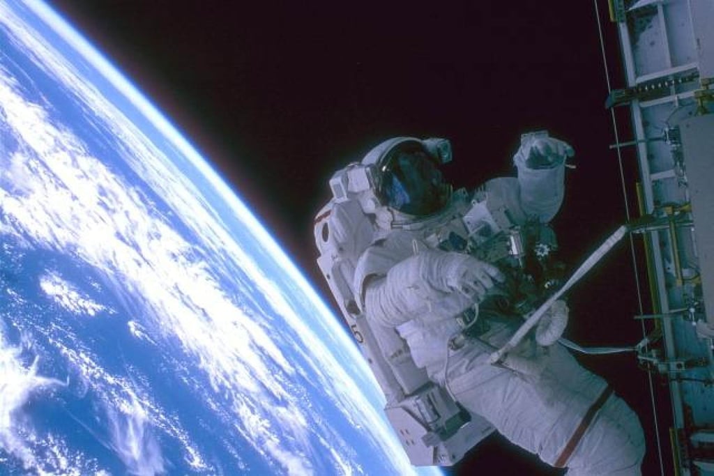 Scott Parazynski with the Earth as a backdrop while he was docked to the Russian space station Mir, on October 1, 1997. Photo: Courtesy of Nasa Scott Parazynski with the Earth as a backdrop while he was docked to the Russian space station Mir, on October 1, 1997. Photo: Courtesy of Nasa