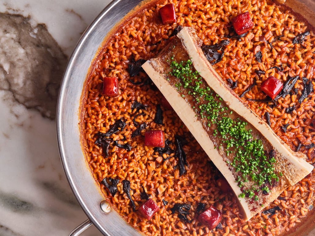 Bone marrow paella at Bayfare Social. Photo: Handout Bone marrow paella at Bayfare Social. Photo: Handout
