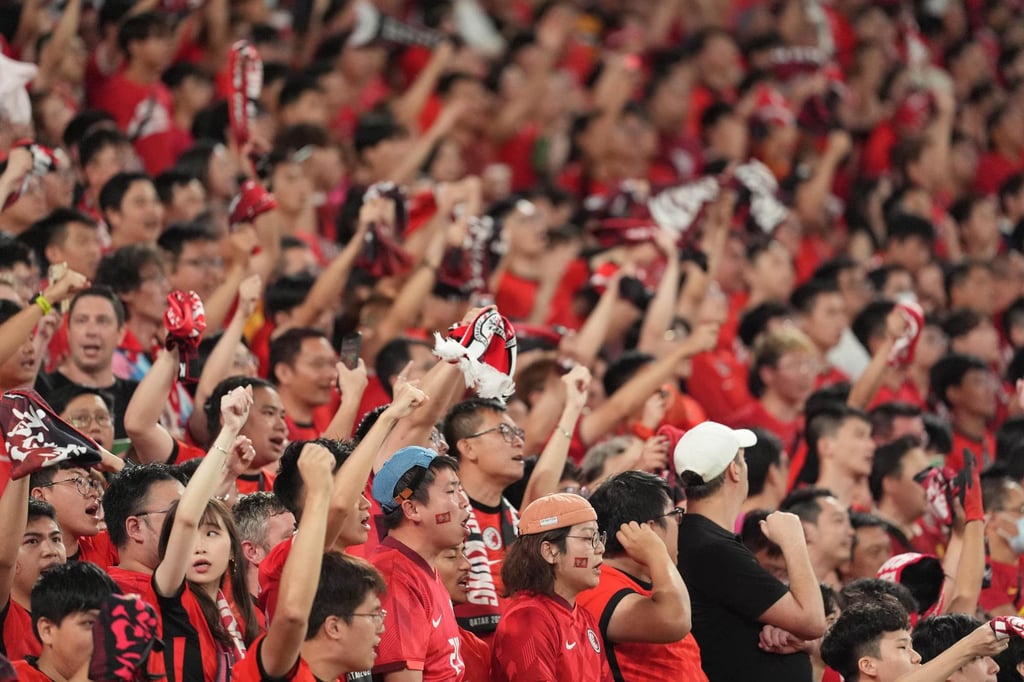 Hong Kong fans cheer on their team during the Asian Cup qualifier against India at Kai Tak Stadium. Photo: Elson Li
