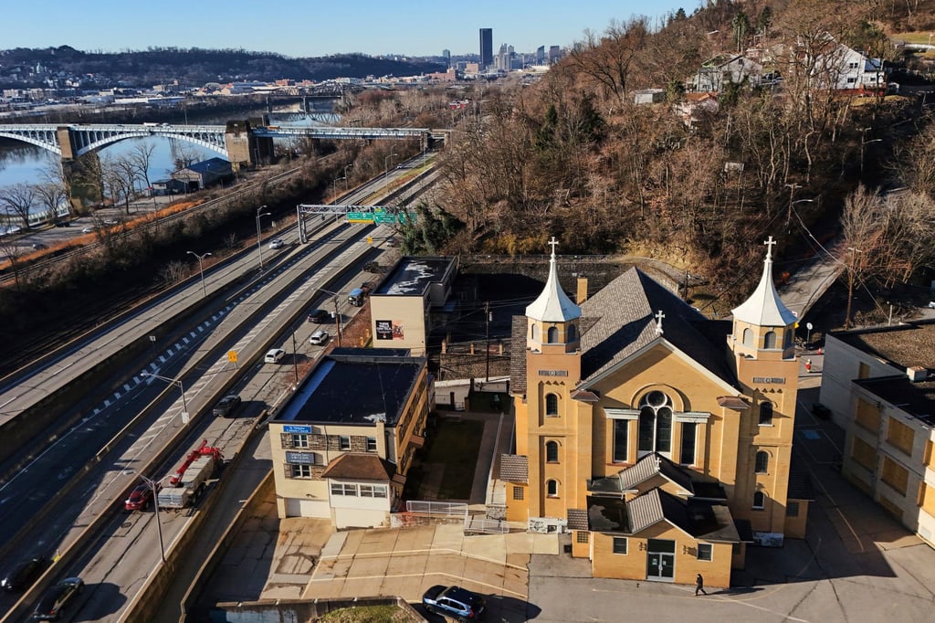 St. Nicholas Croatian Catholic Church stands across the Allegheny River from central Pittsburgh. Photo: AP