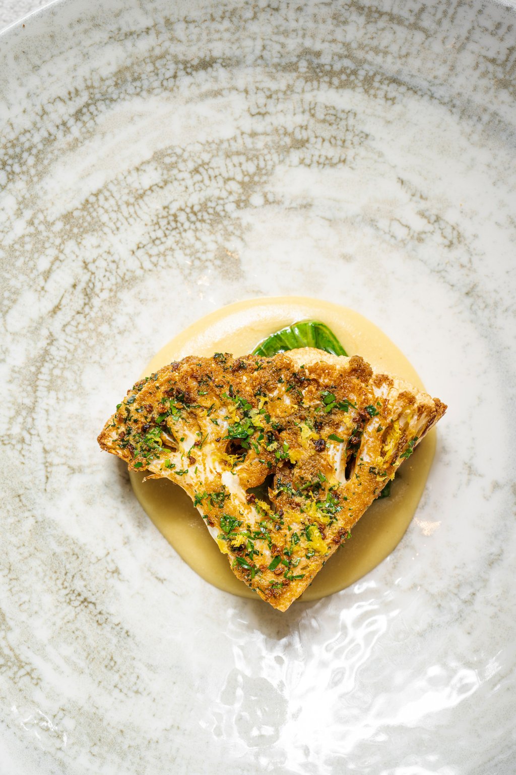 Yeast-battered cauliflower is one of Légume’s signature dishes. Photo: Handout