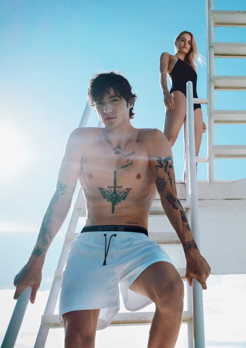 Sporty men’s and women’s swimsuits by EA7 Emporio Armani. Photo: Handout