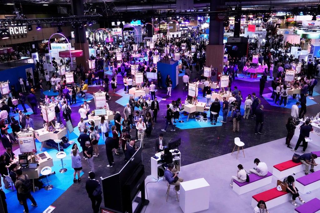 Visitors attend the Vivatech fair, one of Europe’s biggest tech industry shows. Photo: AP Visitors attend the Vivatech fair, one of Europe’s biggest tech industry shows. Photo: AP
