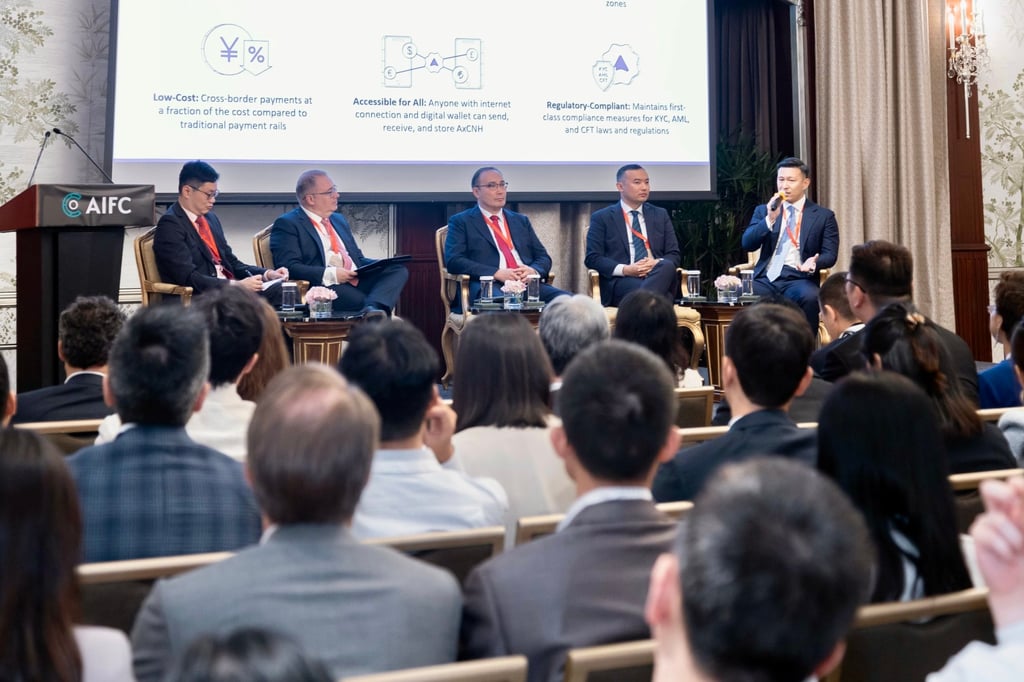 Hill Wang (far right) shares insights into how AnchorX’s offshore yuan-pegged stablecoin, AxCNH, can facilitate trade between Chinese businesses and their belt and road partners during a panel discussion at the AIFC Connect: Hong Kong event.