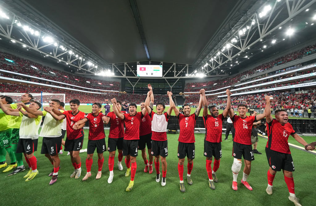 Hong Kong players celebrate winning their first match at Kai Tak Stadium. Photo: Sam Tsang