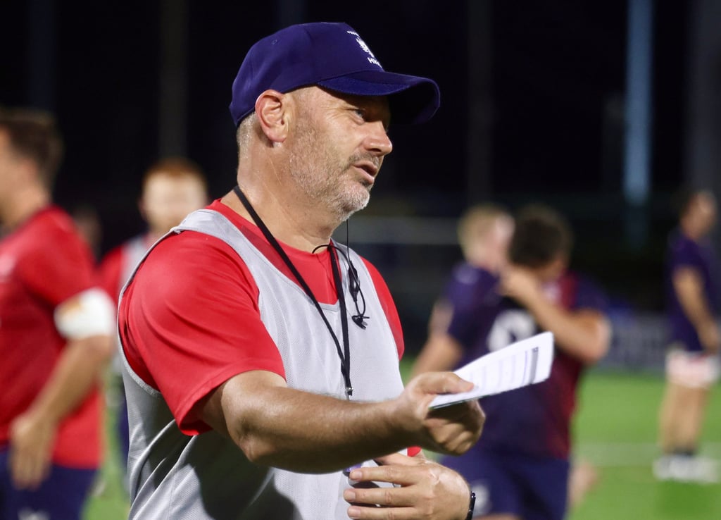 Hong Kong head coach Andrew Douglas gives instructions to his players. Photo: Jonathan Wong