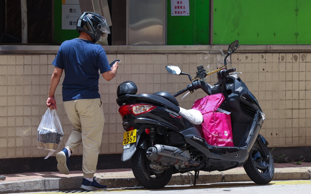 The government is set to introduce proposals to further enhance platform workers’ rights and benefits within the year. Photo: Jelly Tse The government is set to introduce proposals to further enhance platform workers’ rights and benefits within the year. Photo: Jelly Tse