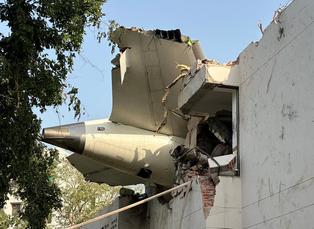 Air India Flight AI171 crash site in Ahmedabad showing aircraft wreckage at medical college