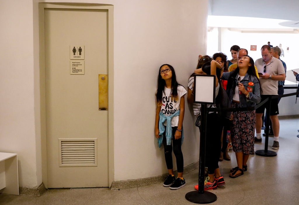 Guests wait for access to the exhibit of Maurizio Cattelan’s “America” a fully functional solid gold toilet, at The Guggenheim Museum in New York City in 2017. Photo: Reuters