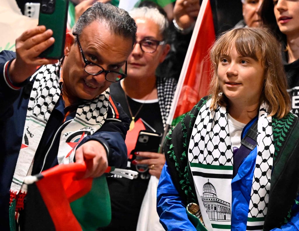 Swedish activist Greta Thunberg (right) is greeted on arrival in Stockholm on Tuesday after she was arrested on board the Madleen and deported. Photo: AFP Swedish activist Greta Thunberg (right) is greeted on arrival in Stockholm on Tuesday after she was arrested on board the Madleen and deported. Photo: AFP