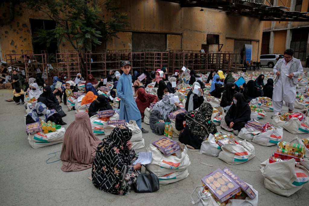 Afghan refugees who have recently returned from neighbouring Pakistan and Iran receive rations, donated by the Indian government, in Kabul, Afghanistan, on May 18. Photo: EPA-EFE Afghan refugees who have recently returned from neighbouring Pakistan and Iran receive rations, donated by the Indian government, in Kabul, Afghanistan, on May 18. Photo: EPA-EFE