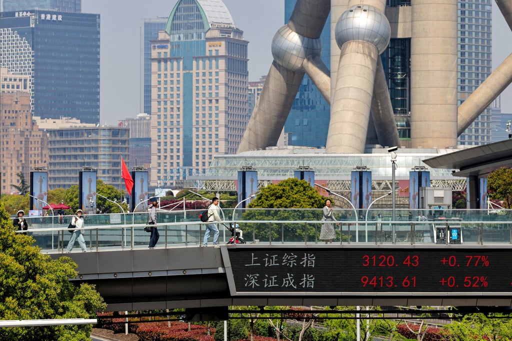 An electronic board shows stock indices on a pedestrian bridge in Shanghai on April 8. Photo: Reuters An electronic board shows stock indices on a pedestrian bridge in Shanghai on April 8. Photo: Reuters