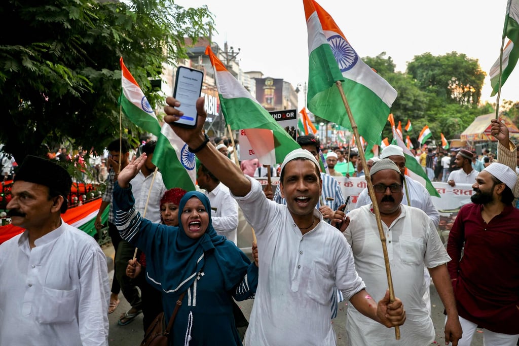 People carry India’s national flag as they take part in a rally on May 24 to express solidarity with the country’s armed forces after India and Pakistan agreed to a ceasefire. Photo: AFP People carry India’s national flag as they take part in a rally on May 24 to express solidarity with the country’s armed forces after India and Pakistan agreed to a ceasefire. Photo: AFP