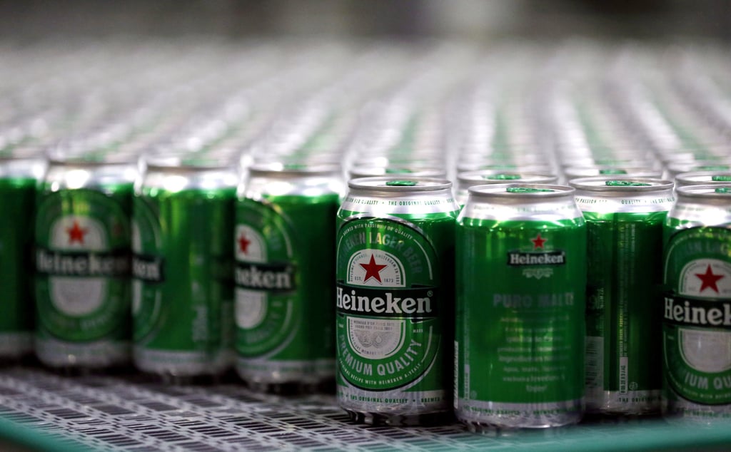 Heineken beers on a production line. The Dutch brand suspended operations at one of its Vietnam breweries last year in response to weakening demand and the initial proposal for the tax hike. Photo: Reuters