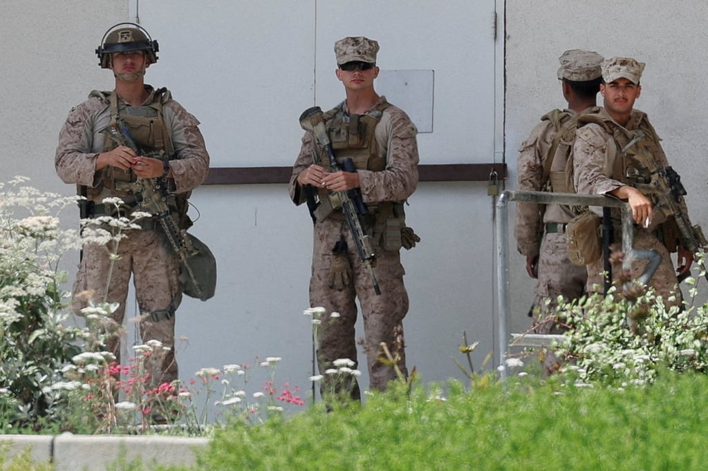US Marines stand guard outside the Wilshire Federal Building in Los Angeles. Photo: Reuters