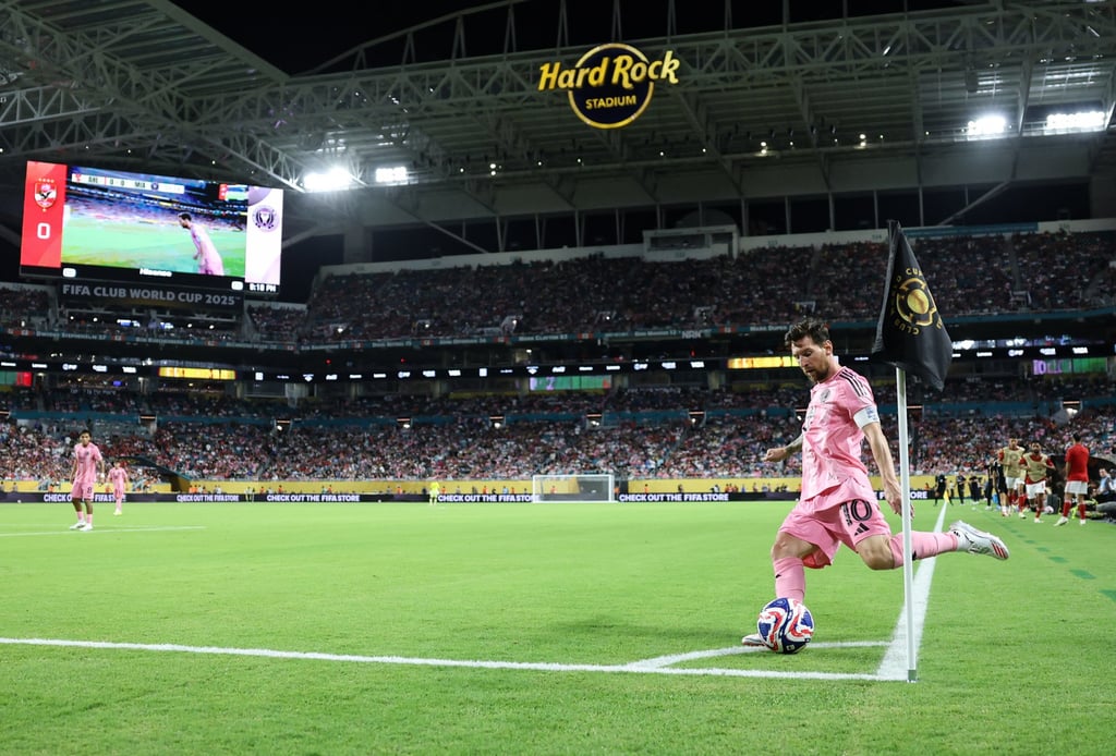 Lionel Messi takes a corner during the opening match on Saturday. Photo: Xinhua
