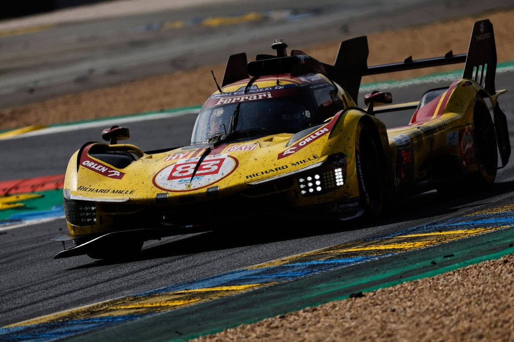 The winning AF Corse car takes a curve during the Le Mans endurance race. Photo: AP The winning AF Corse car takes a curve during the Le Mans endurance race. Photo: AP