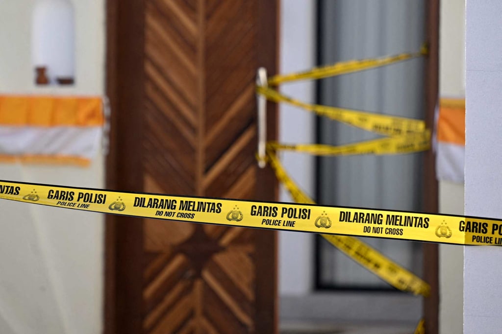 Police tape is seen in front of the villa in Bali where an Australian man was shot dead on Saturday. Photo: AFP Police tape is seen in front of the villa in Bali where an Australian man was shot dead on Saturday. Photo: AFP