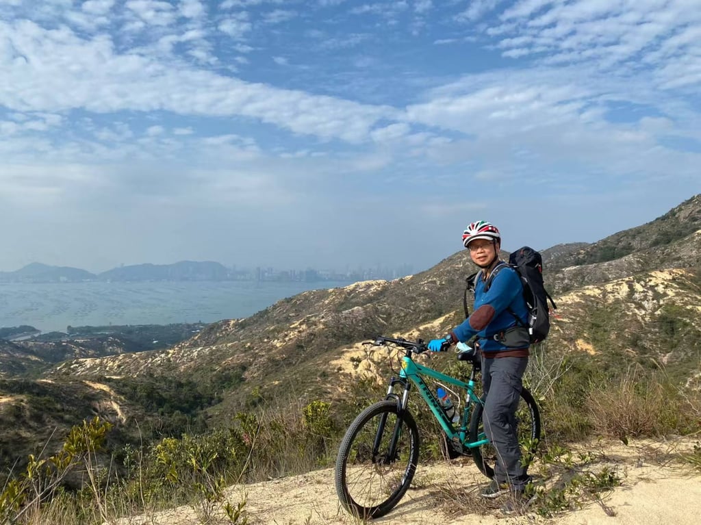 Yu bikes in Yuen Long, Hong Kong, in 2022. Photo: Alfred Yu
