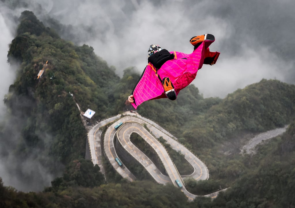 Vincent Descols of France during qualification at the World Wingsuit League China Grand Prix 2016 in Zhangjiajie. Photo: Xinhua Vincent Descols of France during qualification at the World Wingsuit League China Grand Prix 2016 in Zhangjiajie. Photo: Xinhua