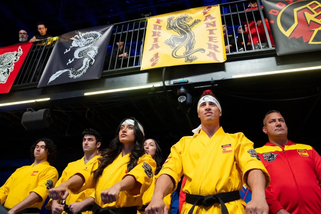 Justin Ortiz (second right) and Jewelianna Ramos-Ortiz (third left) in an episode of Cobra Kai. Photo: Netflix Justin Ortiz (second right) and Jewelianna Ramos-Ortiz (third left) in an episode of Cobra Kai. Photo: Netflix