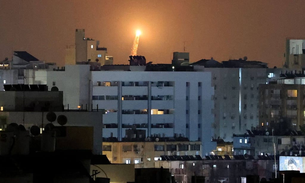 Rocket trails are seen in the sky above the Israeli coastal city of Netanya amid a fresh barrage of Iranian missile attacks on Tuesday. Photo: AFP Rocket trails are seen in the sky above the Israeli coastal city of Netanya amid a fresh barrage of Iranian missile attacks on Tuesday. Photo: AFP