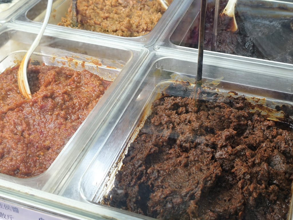 Fermented bean paste (right) at Hong Kong sauce maker Yuet Wo, in Sheung Shui. Photo: Yuet Wo Fermented bean paste (right) at Hong Kong sauce maker Yuet Wo, in Sheung Shui. Photo: Yuet Wo
