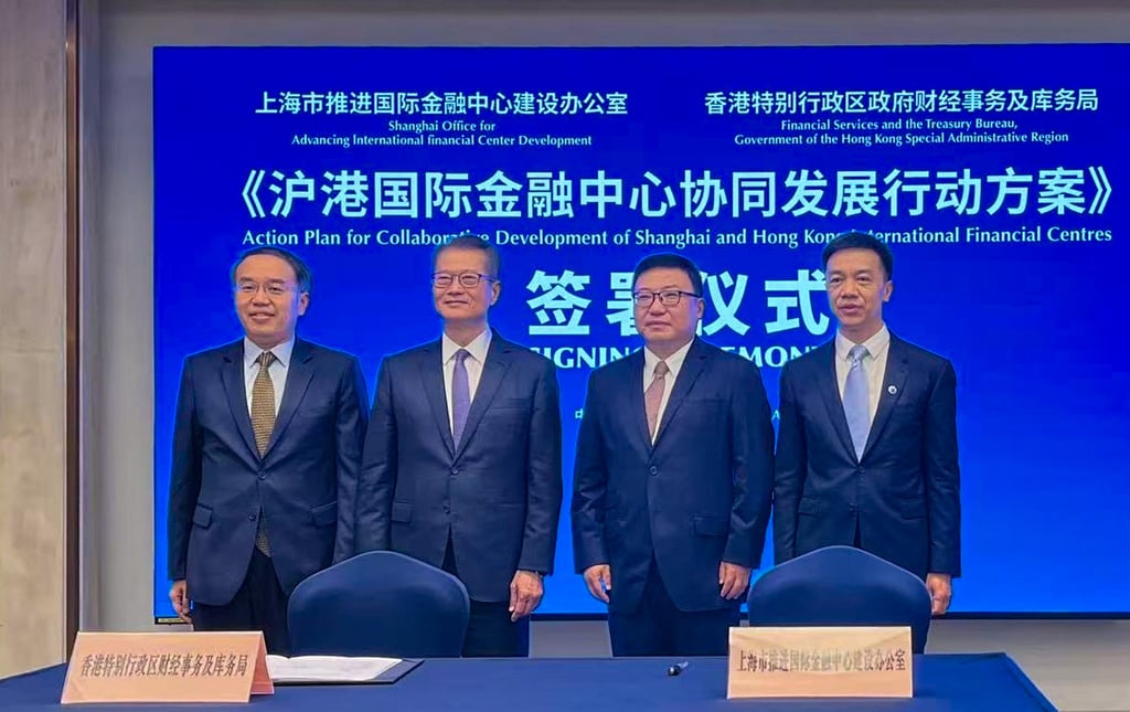 Hong Kong Financial Secretary Paul Chan (second from left) and Shanghai’s executive vice-mayor Wu Wei (second from right) after signing an accord to deepen financial collaboration between the two cities on June 18, 2025. Photo: Daniel Ren Hong Kong Financial Secretary Paul Chan (second from left) and Shanghai’s executive vice-mayor Wu Wei (second from right) after signing an accord to deepen financial collaboration between the two cities on June 18, 2025. Photo: Daniel Ren