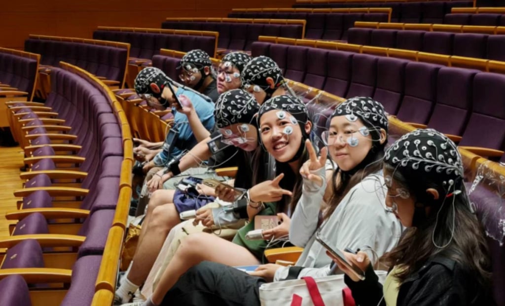 Brain-computer interface technology (BCI), such as that used by audience members at Tsinghua University this month, enables direct communication between the brain and external devices. Photo: Handout Brain-computer interface technology (BCI), such as that used by audience members at Tsinghua University this month, enables direct communication between the brain and external devices. Photo: Handout
