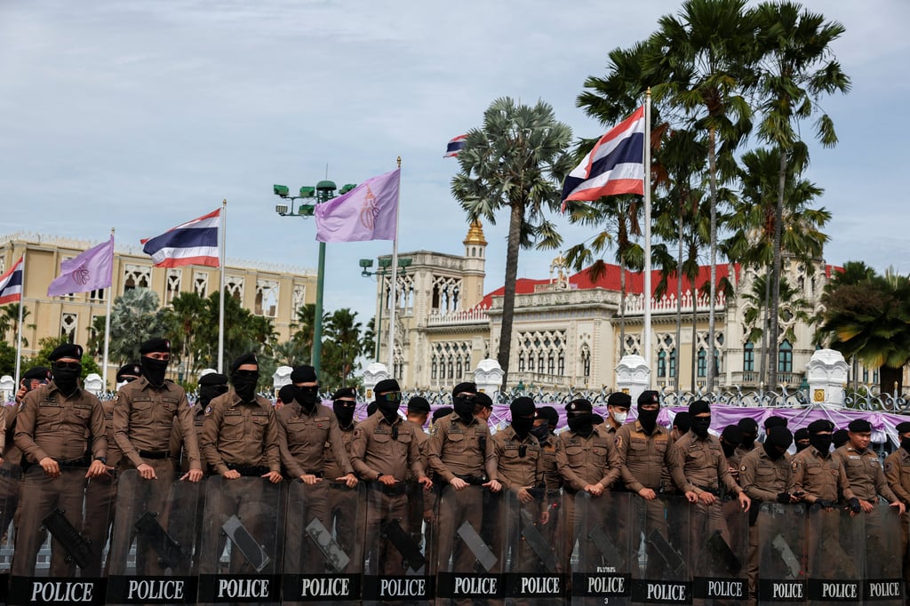 Police officers stand guard in front of Government House in Bangkok on Thursday, ahead of an anti-government protest following a leak of a phone call between Thailand’s Prime Minister Paetongtarn Shinawatra and Cambodia’s Hun Sen. Photo: Reuters Police officers stand guard in front of Government House in Bangkok on Thursday, ahead of an anti-government protest following a leak of a phone call between Thailand’s Prime Minister Paetongtarn Shinawatra and Cambodia’s Hun Sen. Photo: Reuters